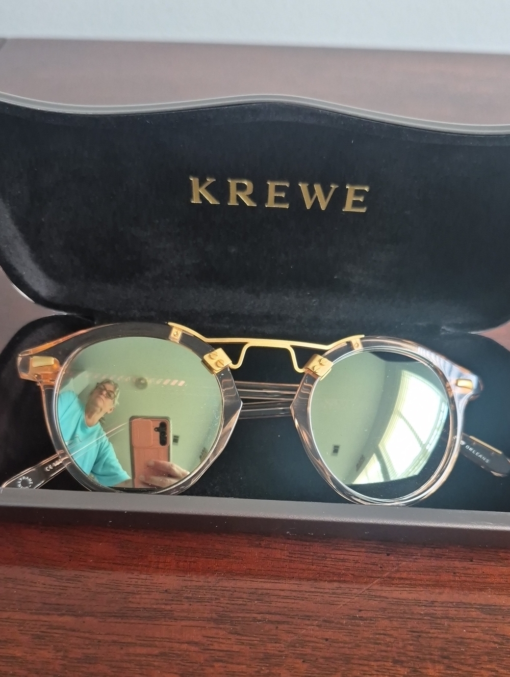 KREWE Translucent Clear Frame Sunglasses with Green Lenses and Gold Hardware